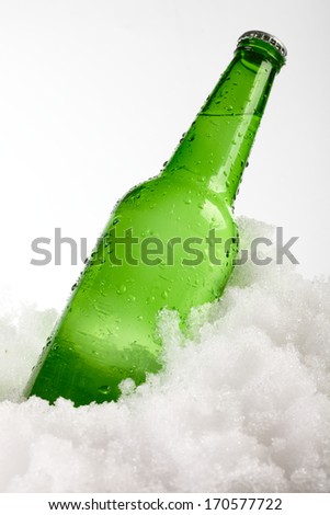 beer bottle in snow
