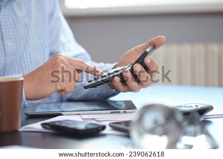 businessman with calculator