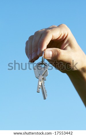 hand  keys  in the blue skies