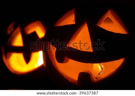 Creepy carved pumpkin face, with a smile