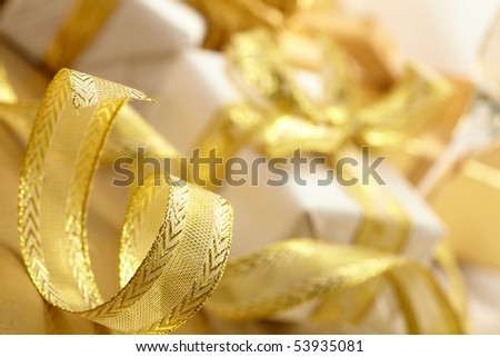 gift boxes with gold ribbon