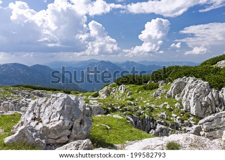 Austrian landscape with Alps on summer day