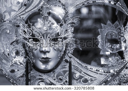 Black and white picture of traditional carnival mask in Venice, Italy