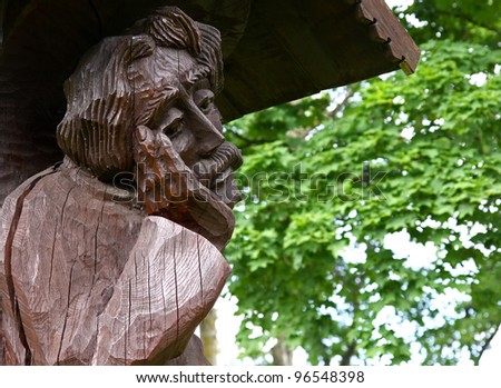 Traditional Lithuanian wooden sculpture of pensive Christ