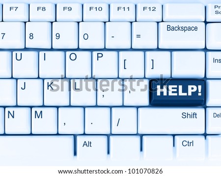 white computer keyboard with the blue button help