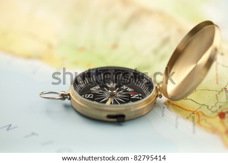 Gold compass & map