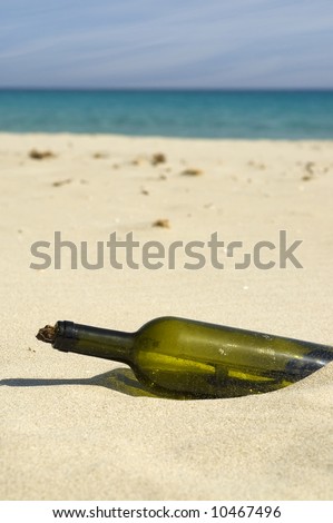 message in a bottle closeup. Beach scenic