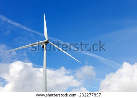 Wind turbine generator on top a hill for the production of clean and renewable energy near Fafe, Portugal