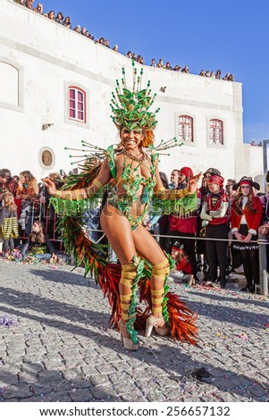 Sesimbra, Portugal. February 17, 2015: Brazilian Samba dancer called Passista in the Rio de Janeiro style Carnaval Parade. The Passista is one of the sexiest performers of this event