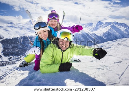 Young people funny action winter ski resort