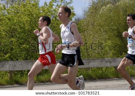 FREDERICIA, DENMARK - MAY 5: Fourth, second and third prize winners Ben Livsey, England,  Russ Houston, and Andy Douglas, Scotland in Little Belt Half Marathon,  Fredericia, Denmark, may 5. 2012.
