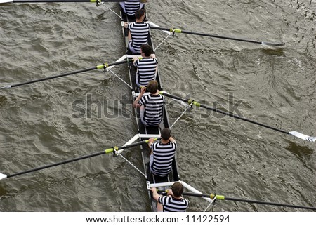 Rowers in eight-oar rowing boats on River Thames in London, England – “The Head of the River Race”