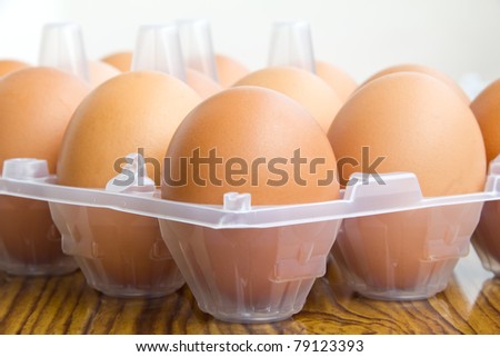 Fresh eggs in plastic tray