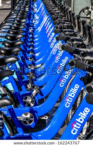 NEW YORK-NOVEMBER 6: New blue Citi Bikes lined up near Madison Square Garden at 8th Avenue in Manhattan on November 6, 2013. The Bike-Share program begins on Memorial Day.