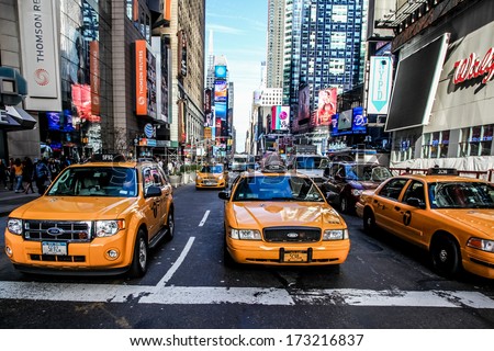 NEW YORK-NOVEMBER 6: Yellow cabs and busy Time Square in Manhattan on November 6, 2013.