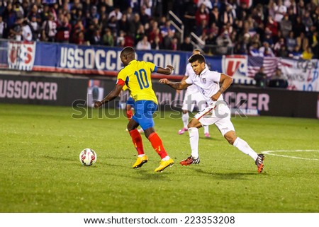 HARTFORD - OCTOBER 10:  DeAndre Yedlin #2 with ecuadorian player #10 on US  Friendly match between US Men`s National Team vs Ecuador,  on October 10, 2014, in Rentschler Field stadium, Hartford, USA.