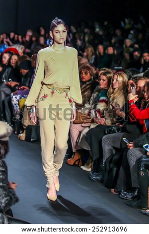 NEW YORK - FEBRUARY 13: A model walks the runway at the Mongol Fall/Winter 2015 collection during Mercedes-Benz Fashion Week in New York on February 13, 2015.