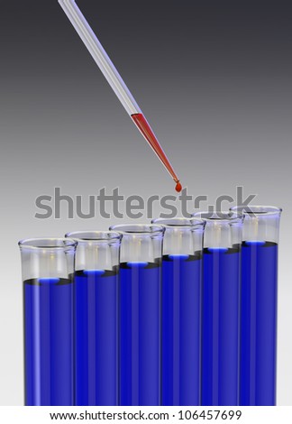 Test tubes and pipette with a drop of red liquid