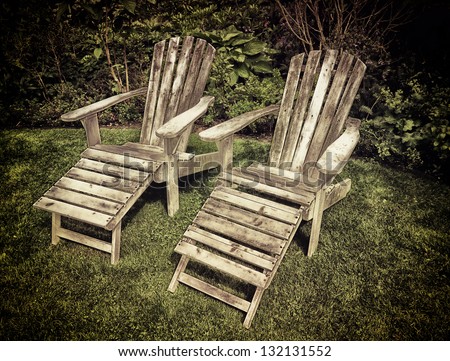 Two old garden chairs in retro style.