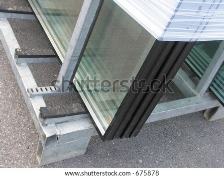 New sealed glass units at building site.