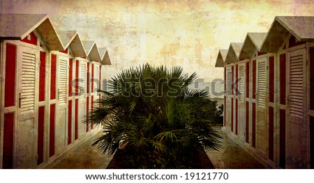 Artistic work of my own in retro style - Postcard from Italy. - Season ended - Adriatic Sea - Beach huts and palm Fano, Italy