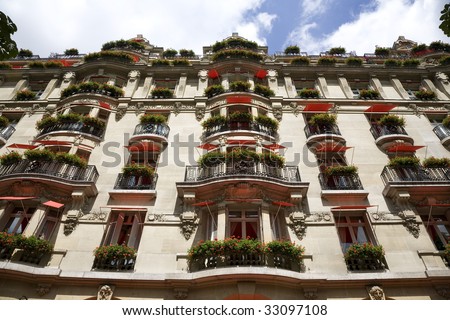 The facade of the expensive Hotel Plaza Athenee - Paris, France.