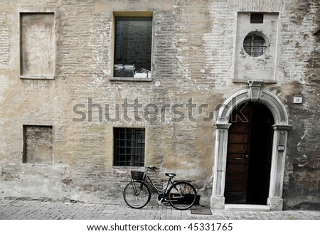 Old Italian facade with new bike - Senigallia, Umbria - Italy.