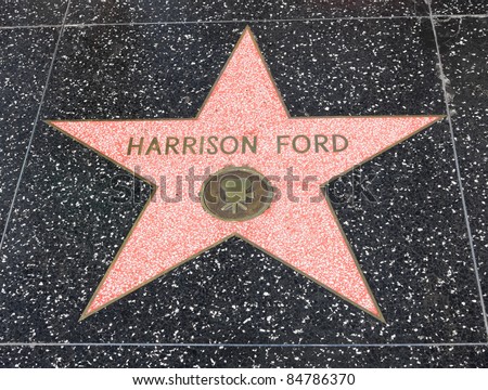 HOLLYWOOD - SEPTEMBER 4: Harrison Ford\'s star on Hollywood Walk of Fame on September 4, 2011 in Hollywood, California. This star is located on Hollywood Blvd. and is one of 2400 celebrity stars.
