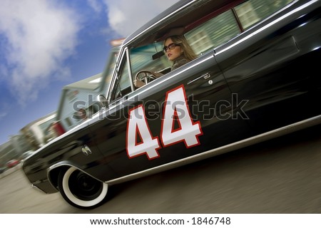Girl driving Dodge Charger