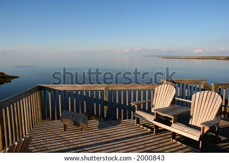 A water-front deck in a sunny afternoon
