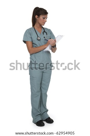Full length photo of pretty female health care worker dressed in scrubs on white background.