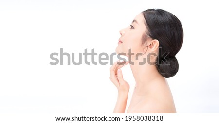 Closeup portrait of beauty asian woman with fair perfect healthy lift glow skin hand touching chin neck isolated on white, beautiful asia girl with pretty smile face. Beauty korean spa skincare banner