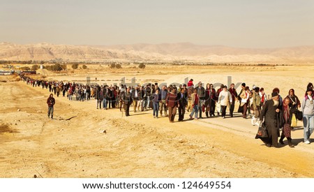 JORDAN VALLEY, ISRAEL - JANUARY 18: Day of a sacred Christening of Jesus  with going pilgrims. January 18, 2008, Jordan valley, Israel. 5 km north of the Jordan River flows into the Dead Sea