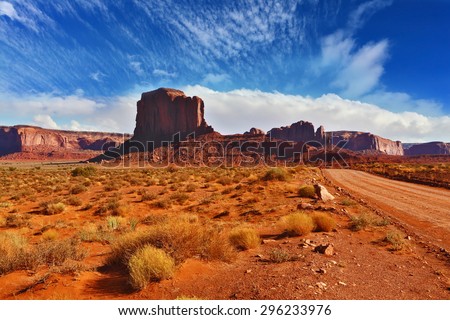 Monument Valley in the Navajo Indian Reservation. Arizona, USA. The unique red sandstone buttes \