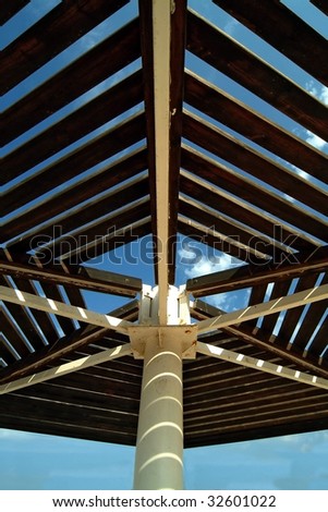 Wooden roof of a beach sunshade