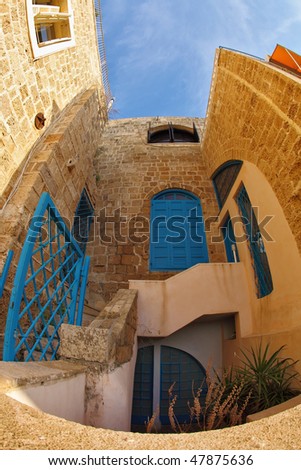 The ancient small city Jaffo on the bank of Mediterranean sea, in  lens \