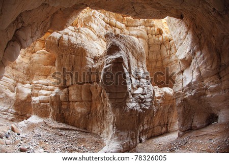 The picturesque narrow slot canyon in the mountains of the ancient Dead Sea