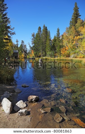 A charming mountain lake in California. Clear blue sky reflected in the lake water