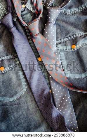Detail of denim vintage shirt with three ties