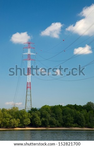 Tall electricity line crossing river