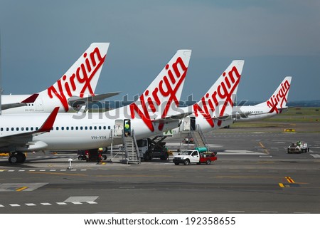 SYDNEY - APRIL 3: Aircrafts of the Virgin Australia fleet at Sydney Domestic Airport April 3th, 2014. Virgin Australia is Australia\'s second largest airline.