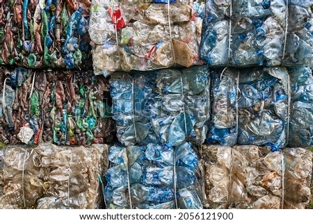 Plastic waste pile, PET bottles collected into bales for recycling Stockfoto © 