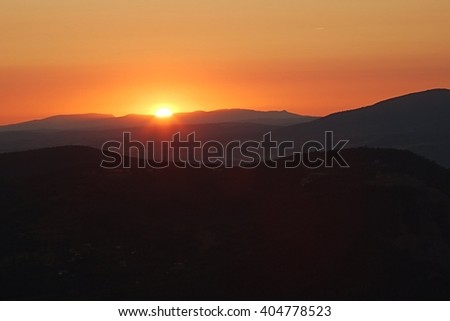 Similar – Foto Bild Sonnenuntergangshimmel über Hügeln in der Wüste