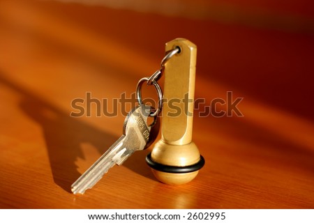 Key of a hotel room on a table