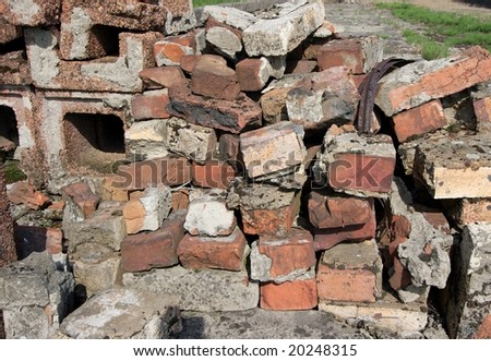 Debris of an old brick wall fallen apart