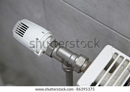 Radiator adjusting knob, heating system