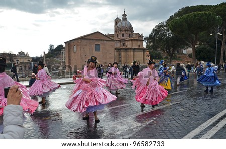 ROME , ITALY -  FEBRUARY 19 : Unidentified female dancers participate at the Carnival of Rome on February 19 , 2012 in Rome , Italy