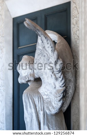 angel knocking on door