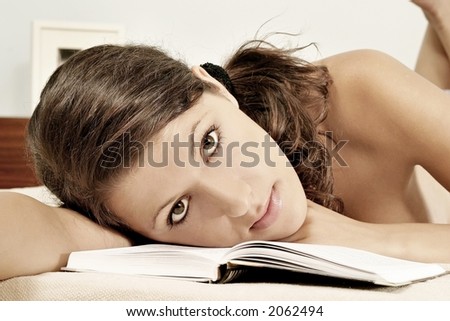 auburn haired girl, young woman with a book