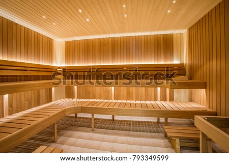 Similar – Image, Stock Photo a wooden sauna from the inside with a man taking a sauna